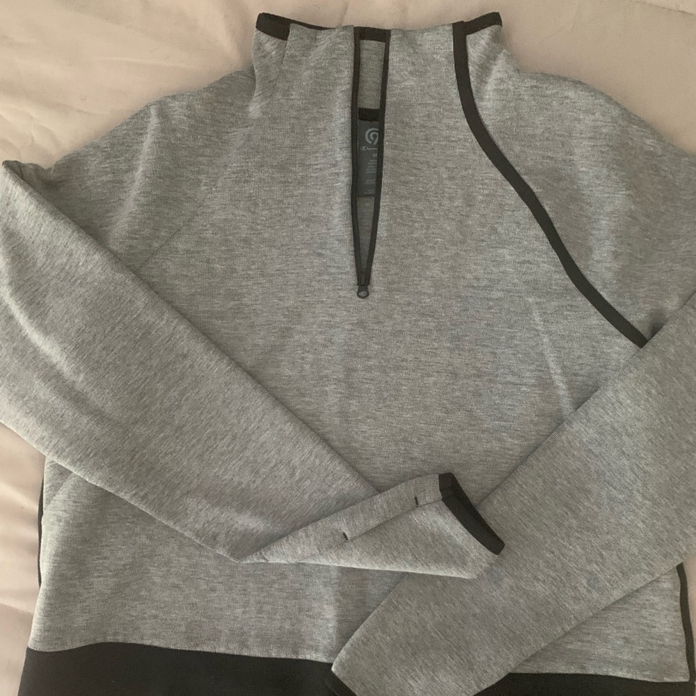 Quarter zip sweatshirt with thumb holes